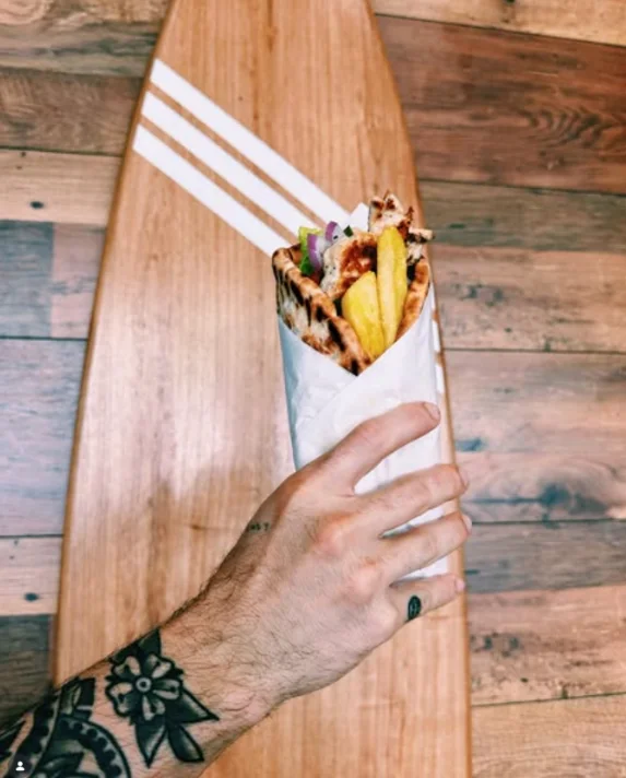 Chicken Gyros — grilled chicken, tzatziki and pita with chips at PointBreak Cafe, Coolangatta